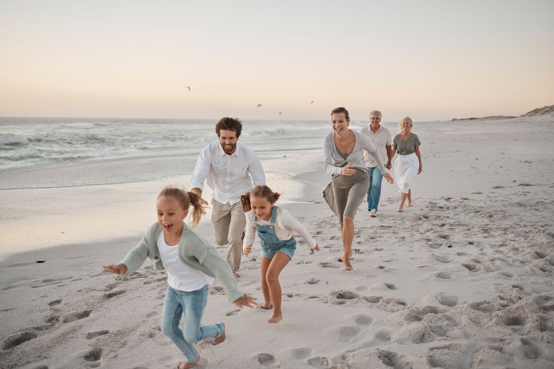 Big family, kids and generations at sunset