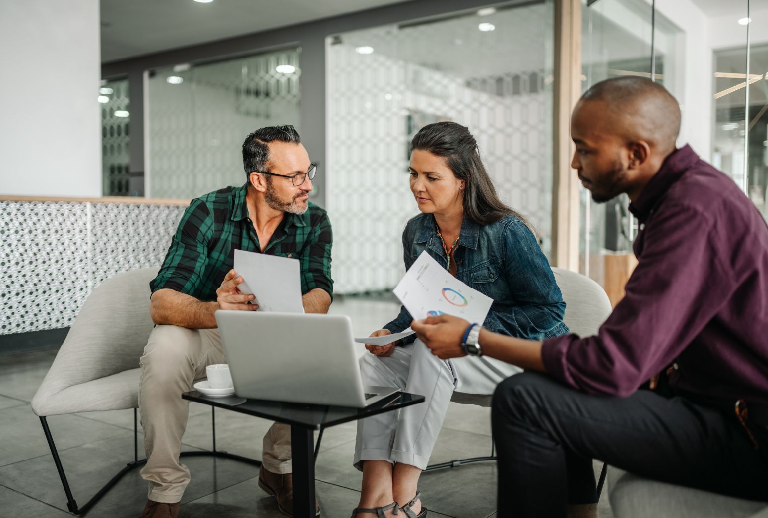 Casual meeting of diverse business team