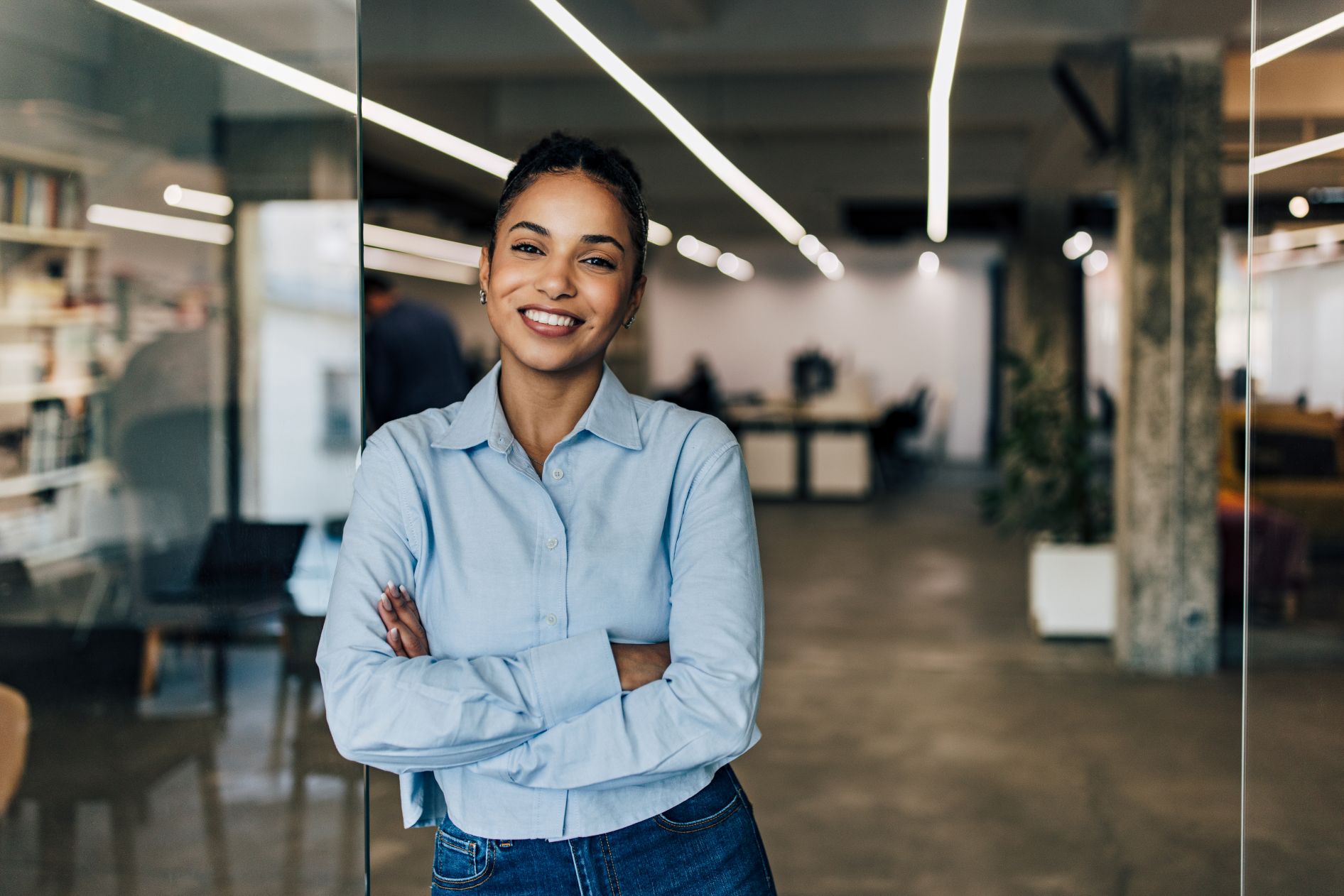 Smilling businesswoman standing at the office