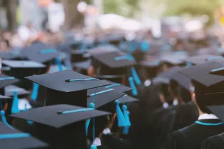 Backside graduation hats during commencement
